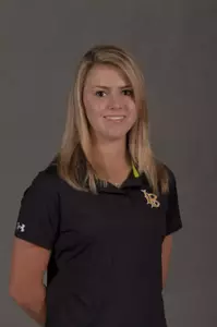 Freshman Bow-Kay Salotti leads the field of 10 individuals by three strokes at the Price's "Give 'Em Five" Intercollegiate