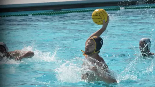 10/8//11 - Aleksandar Petrovic (4) of the LBSU Men's Water Polo team celebrates as he scores on a penalty shot against Concordia (Calif.)
Long Beach went on to win 11-9.
Photo by Steven Georges/Long Beach State