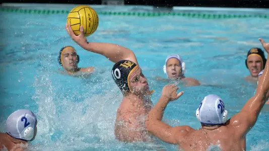 10/22/11 - Dan Matulis (10) of the LBSU Men's Water Polo team scores against UCSB during a game at Long Beach. Photo by Steven Georges/Long Beach State