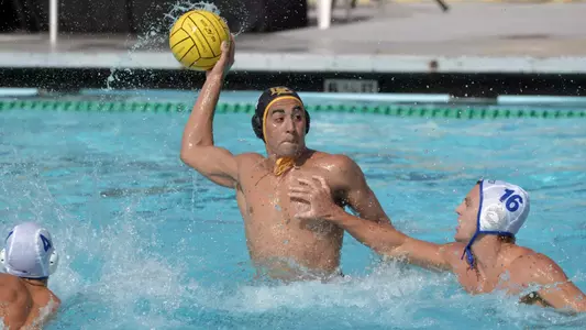 10/22//11 - Nick Rascon (14) of the  LBSU Men's Water Polo team takes a shot over UCSB during a game at Long Beach.
Photo by Steven Georges/Long Beach State