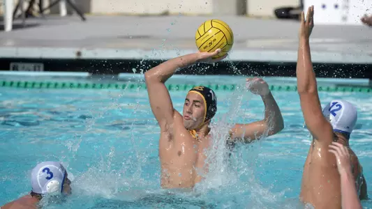10/22/11 - Nick Rascon (14) of the LBSU Men's Water Polo team looks for an open teammate during a game against UCSB at Long Beach. Photo by Steven Georges/Long Beach State