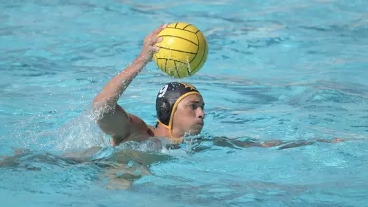 10/22/11 - Brian Schiefer (9) of the  LBSU Men's Water Polo team looks for an open shot over UCSB during a game at Long Beach. Photo by Steven Georges/Long Beach State