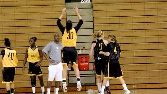 Sendy Valles (30) goes up for the rebound.