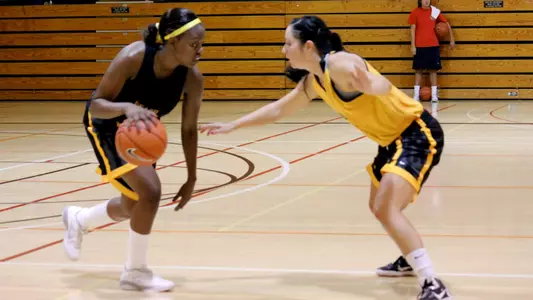 Sarah Lottinville guards Jhakia McDonald in a drill.