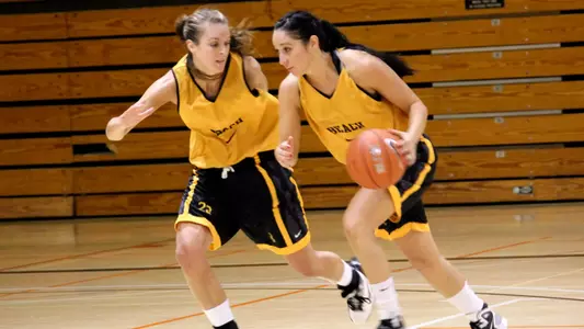 Mary Ochiltree guards Sarah Lottinville in a drill.