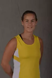 Freshman Laura Bernard won a three-set match over Kat Facey to advance to the Round of 16.