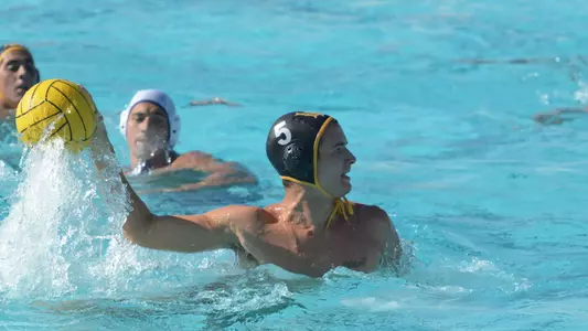 10/8//11 - Robert Robinson (5) of the LBSU Men's Water Polo team shoots and scores against Cal.
Photo by Steven Georges/Long Beach State