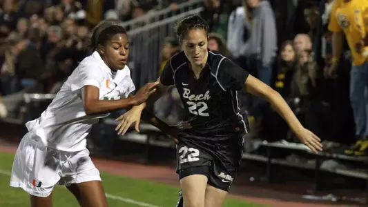 11/18/2011: Senior Nicole Hubbard  advances the ball down the sideline moments before passing to teammate Kelsey Wilson who then scored the game's only goal as Long Beach State defeated Miami, 1-0, in a second round NCAA women's soccer match at UCLA.