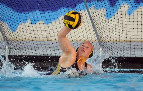 Senior Kristen Stragier makes one of her 11 saves in an 8-7 loss to UC Irvine.