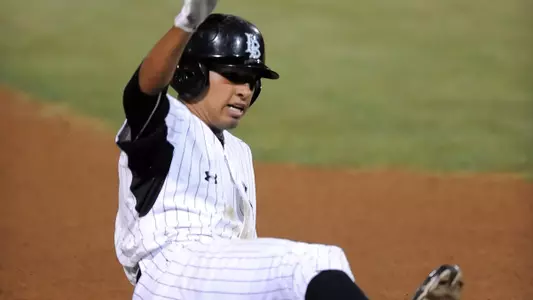 Avila slides into third on his second hit, a triple.