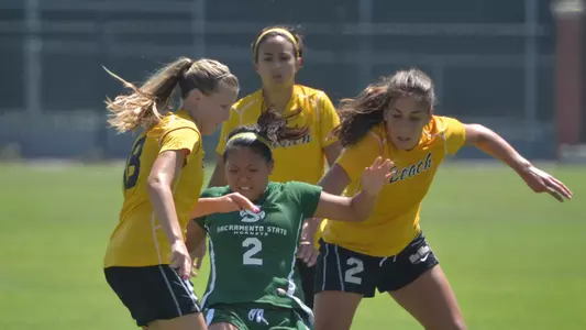(Left to Right) Sophomore midfielder Kelsey Wilson, forward Nadia Link and midfielder Sidney Garza. (Photo by Steven Georges/Long Beach State)