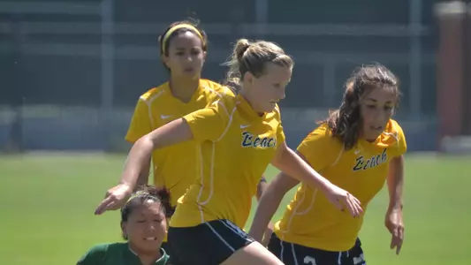 Kelsey Wilson (18) left, and Sidney Garza (2). (Photo by Steven Georges/Long Beach State)