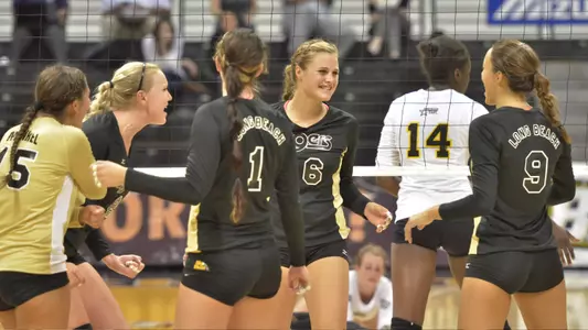 8/20/11 - Bre Mackie (6) of the Long Beach State Women's Volleyball team celebrates a key point with her team as they play UMBC during the Long Beach State Mizuno Invitational at the Pyramid.
Long Beach went on to win 3-0.
Photos by Steven Georges/Long Beach State