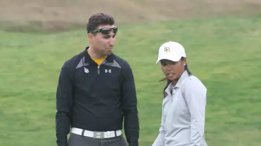 Sophomore Rochelle Chan (right) with head coach Joey Cerulle, recorded both a career and tournament low 66 at the Rose City Collegiate.