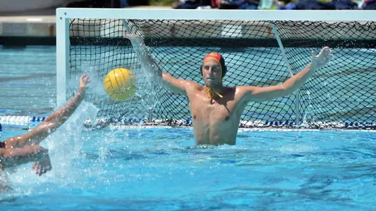 9/3//11 - Matthew Kubeck (1) of the Long Beach State Men's Water Polo team blocks a shot from Fresno during the UC Irvine Invitational at UCI.
Photo by Steven Georges/Long Beach State