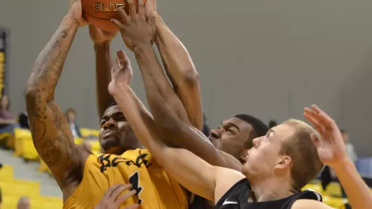 1/14/12 - Eugene Phelps (4) of the Long Beach State Men's Basketball team.  (Photo by Steven Georges/LBSU)