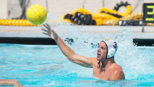 Nathan McConnell in the Annual Alumni Water Polo match at the 49er Campus pool, Sat. Sept., 22, 2012.