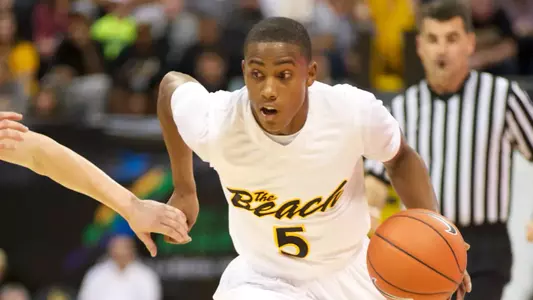 Mike Caffey brings the ball up the floor against North Alabama on Saturday, Nov. 10 at the Walter Pyramid.