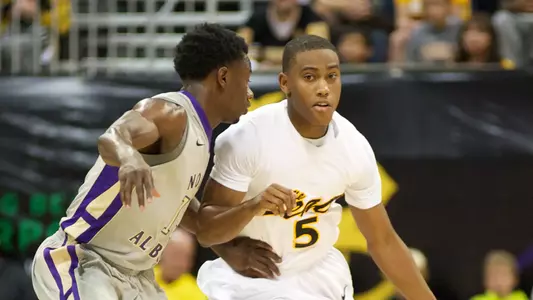Mike Caffey dribbles against North Alabama on Saturday, Nov. 10 at the Walter Pyramid.