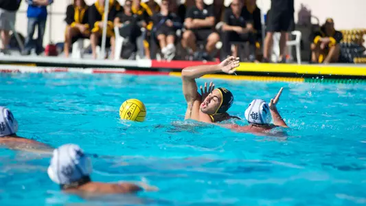 Nick Rascon trying to break free from UCI's #11 Justin Papa Sunday, Nov. 11, at the Campus Pool.
