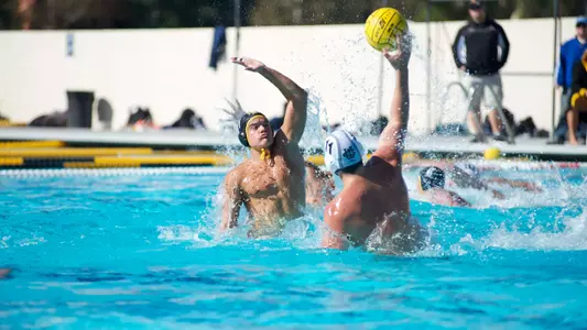 Milos Vrzic jumps to defend a shot against UC Irvine Sunday, Nov. 11, at the Campus Pool.
