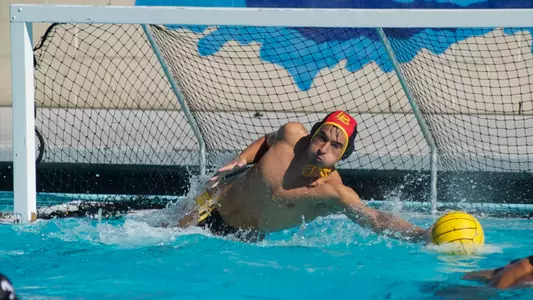 Balint Meszaros barely gets a hand on a ball against UC Irvine Sunday, Nov. 11, at the Campus Pool.