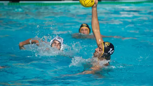 Nick Rascon fires in one of this three goals against UC Irvine Sunday, Nov. 11, at the Campus Pool.