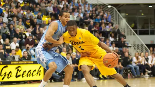 Mike Caffey dribbles against No. 11 North Carolina on Friday, Nov. 16.