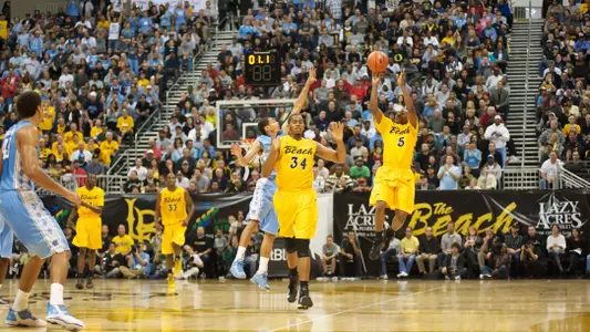Mike Caffey lets go a shot at the end of the first half against No. 11 North Carolina on Friday, Nov. 16.