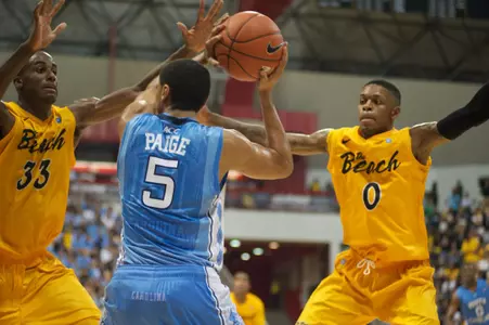 Nick Shepherd and Kris Gulley double-team Marcus Paige of North Carolina on Friday, Nov. 15.