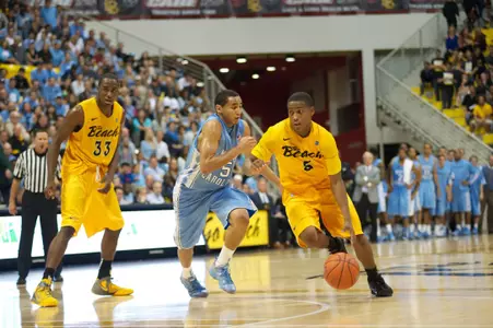 Mike Caffey brings the ball up the court against No. 11 North Carolina on Friday, Nov. 16.