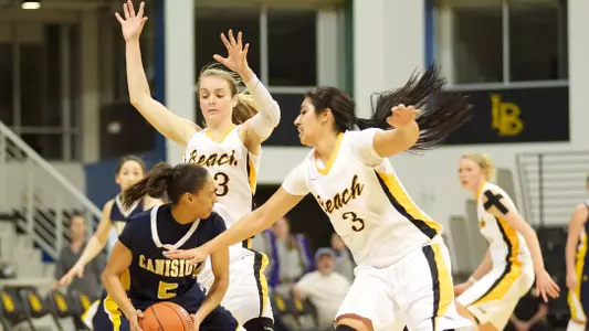 Mary Ochiltree and Alex Sanchez in the Beach Classic game against Canisius at the Walter Pyramid, Long Beach, Calif., Thu., Dec. 20, 2012.