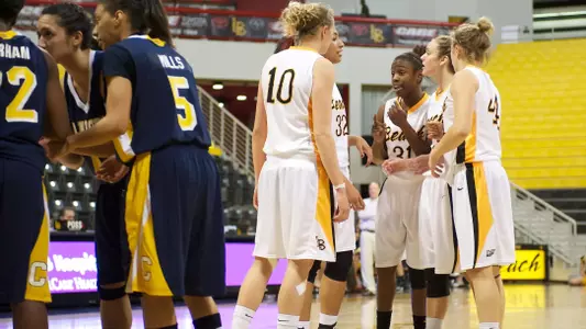 The 49ers gather in the Beach Classic game against Canisius at the Walter Pyramid, Long Beach, Calif., Thu., Dec. 20, 2012.