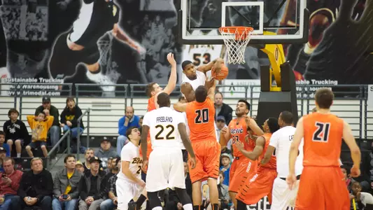 Dan Jennings grabs a rebound during the Big West Conference opener against Pacific Saturday afternoon at the Water Pyramid.