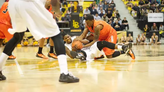 Dan Jennings fights for a loose ball during the game against Pacific Saturday afternoon at the Water Pyramid.