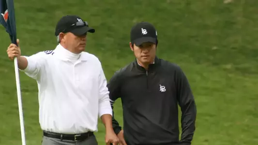 New 49er head coach Mickey Yokoi and Kevin Lim at the Folino Invitational.  Lim shares the lead after the second round after reording a career-low 68.