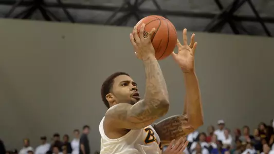 2/22/12 - Eugene Phelps (4) of the Long Beach State Men's Basketball team.  (Photo by Steven Georges/LBSU)