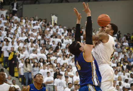 2/22/12 - Eugene Phelps (4) of the Long Beach State Men's Basketball team.  (Photo by Steven Georges/LBSU)