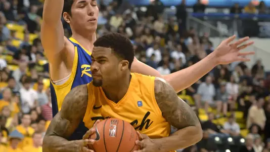2/25/12 - Eugene Phelps (4) of the Long Beach State Basketball team.
Photo by Steven Georges/LBSU