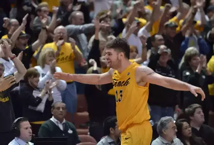 3/10/12 - Edis Dervisevic (13) of the Long Beach State Basketball team celebrates near the end of the Big West Tournament Championship game against UCSB Saturday night at the Honda Center.
Photo by Steven Georges/LBSU
LBSU Photo Archive - www.StevenGeorges.com/LBSU