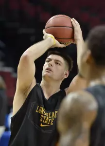 3/14/12 - Edis Dervisevic (13) throws free throws during Wednesday's practice at the Rose Garden.
Photo by Steven Georges/LBSU