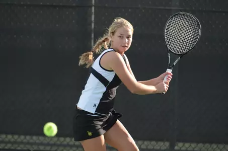 Karolina Rozenberg won twice while playing both singles and doubles Thursday.