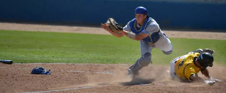4/15/12 - Brennan Metzger (12) of the Long Beach State Dirtbags slides home for the run.
Photo by Steven Georges/LBSU