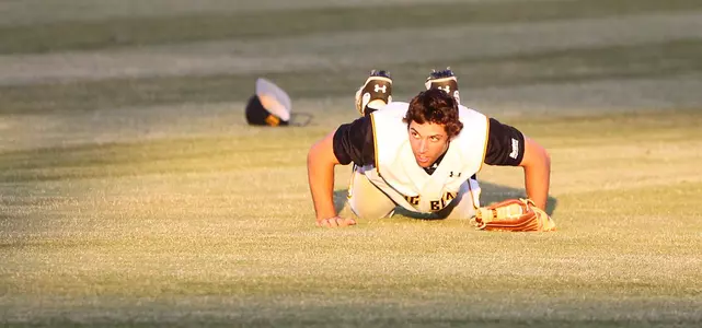 Brennan Metzger makes a diving catch in center field.