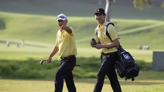Phillip Chian (right) and head coach Mickey Yokoi at the 2012 NCAA Men's Golf Championship at Riviera Country Club in Pacific Palisades.  (Photo by Darryl Oumi/LBSU)