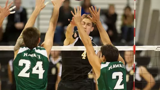 Taylor Crabb hits in the Mountain Pacific Sports Federation volleyball match against University of Hawaii at the Walter Pyramid, Long Beach, Calif., Fri., Jan. 18, 2013