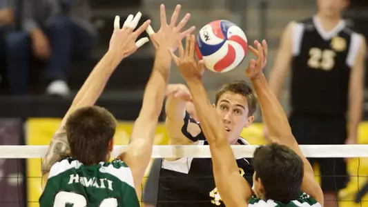 Taylor Crabb hits in the Mountain Pacific Sports Federation volleyball match against University of Hawaii at the Walter Pyramid, Long Beach, Calif., Fri., Jan. 18, 2013