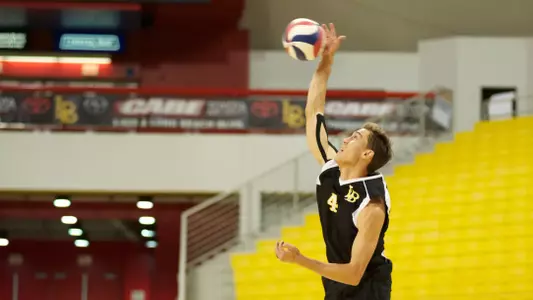 Taylor Crabb serves in the Mountain Pacific Sports Federation volleyball match against University of Hawaii at the Walter Pyramid, Long Beach, Calif., Fri., Jan. 18, 2013