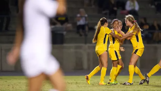 The 49ers celebrate the goal by Mimi Rangel in the match against UC Irvine at Anteater Stadium.  (Photo by John Fajardo/LBSU)