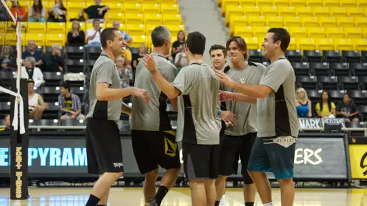 The former 49ers celebrate a point in the alumni match that was held on Saturday, Oct. 19.